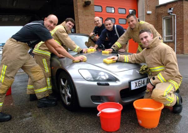The firefighters will be washing cars in exchange for a charity donation ENGSNL00120110919093549