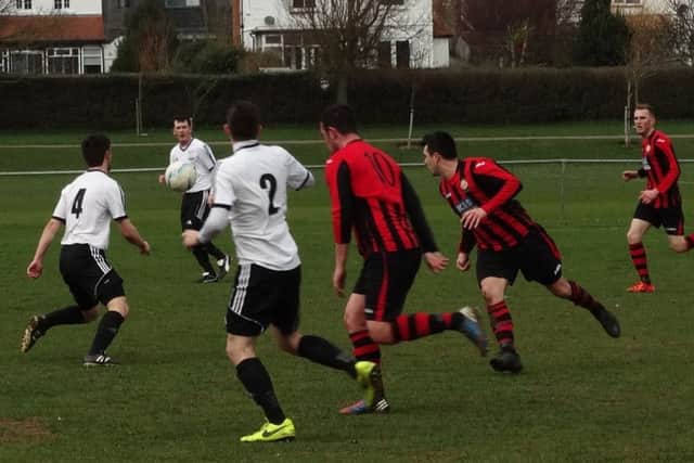 Midfield action from Saturday's clash at The Polegrove. Picture courtesy Mark Killy