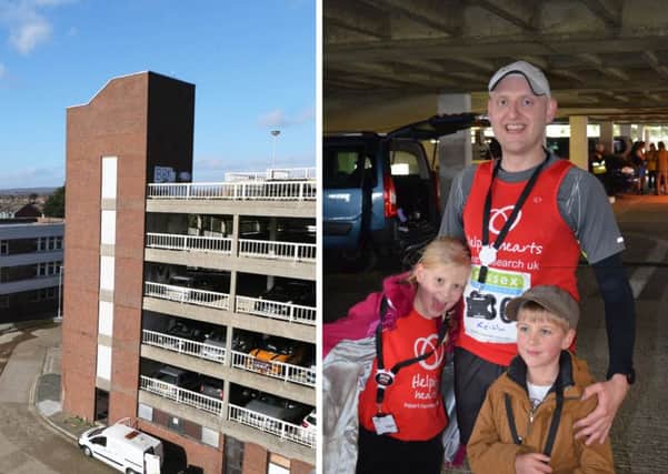 Keith took part in the UK's first car park marathon, cheered on by his children Clodagh (left) and Paddy. Pictures: Eddie Mitchell, Jon Lavis