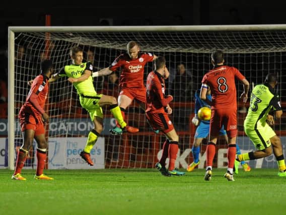 Crawley Town's Mark Connolly was kept busy in defence against Exeter City