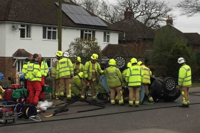 Fire crews were called to the vehicle on its roof earlier today. Picture: Eddie Mitchell
