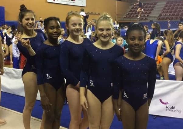 Comfort Yeates (centre) with her tumbling team-mates
