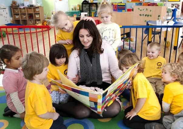 Caroline Ansell reading to nursery school children at Lions Nursery a few years ago SUS-170203-090844001