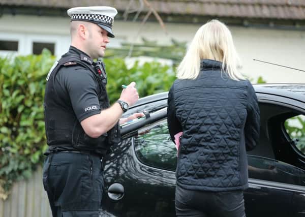 An officer on patrol yesterday near Brighton. Picture: Eddie Mitchell