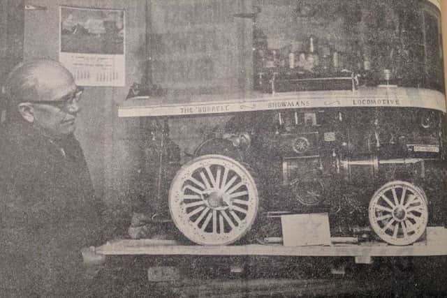 Mr William Heather, of Stedham, with the model traction engine which won him acclaim at an exhibition in London