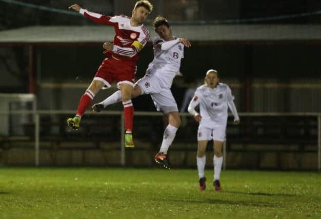 Frannie Collin goes up for a header against Hythe. Picture courtesy Scott White