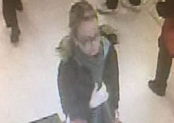 Police wish to speak with this woman in connection with a theft in a Brighton Supermarket SUS-170203-174014001