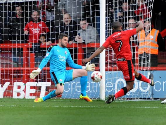 Crawley Town goalkeeper Glenn Morris saves a short-range shot from Doncaster Rovers' Alfie May on the rebound after saving a penalty by John Marquis.
Picture by STEVE ROBARDS