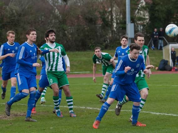 Action from Saturday's match by Tommy McMillan