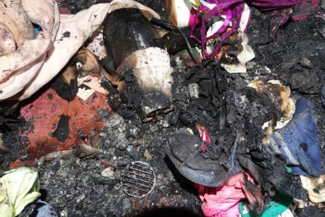 Charred remains of hairdryer  after Hassocks fire.