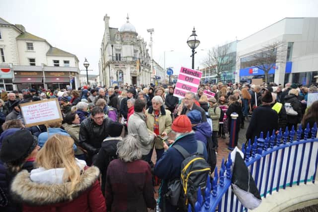 Demonstrators in Eastbourne protesting against the proposed sale of 3,000 acres of downland (Photo by Jon Rigby) SUS-170227-113903008