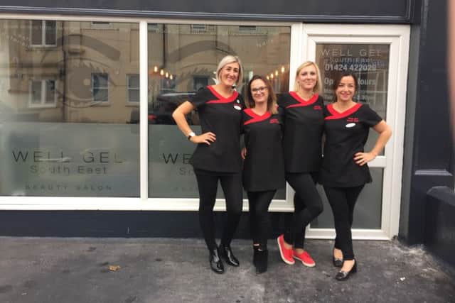 Hannah Bannerman-Watson, pictured far right, when the salon opened in 2016. SUS-161031-134246001