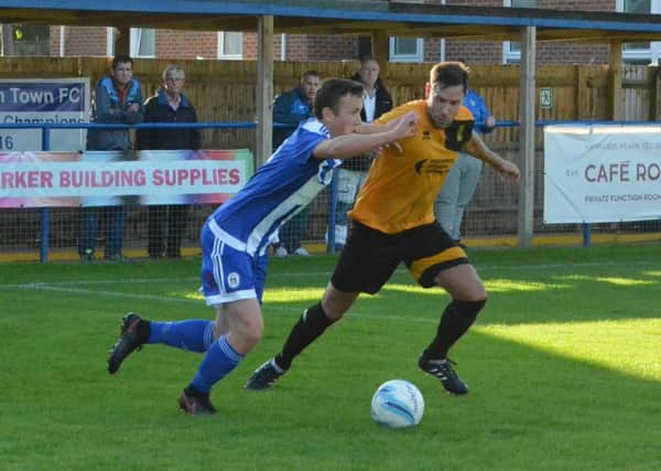 Alfie Rogers in action for former side Haywards Heath Town last year. Picture by Grahame Lehkyj SUS-160210-212011001