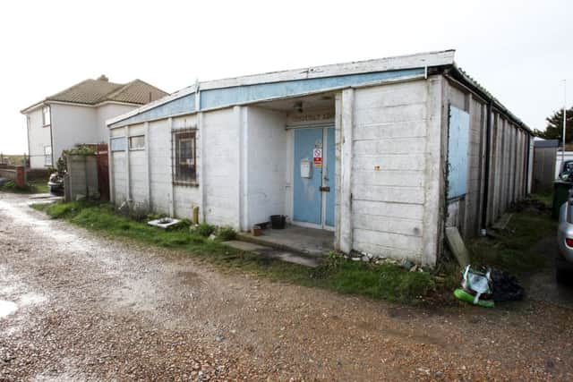 The hut, in Kings Walk, Shoreham Beach, has been at the centre of questions over ownership