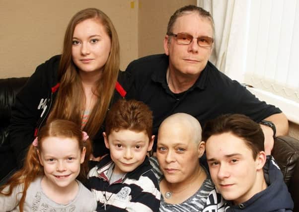 Cancer sufferer Charlotte Harris, pictured with left to right: Libby, nine, Jolene, 16, Huxley, seven, Neil, and Cain, 15. Picture: Derek Martin