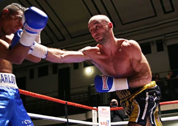 Ben Jones in action against Carlos Osorio (Nicaragua) at York Hall. Picture by Natalie Mayhew, Butterfly Boxing SUS-160811-120248002