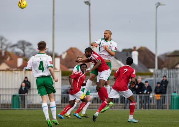 Sami El-Abd wins a header against Leatherhead - but he will miss the games with Leiston and Burgess Hill / Picture by Tim Hale