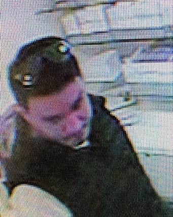 Police have released this CCTV image of a man they would like to speak in connection with the theft of beauty products from a shop in Midhurst.