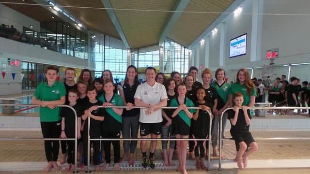Joanne Jackson (left, centre) and Harry Needs (centre, right) with Worthing Swimming Club members