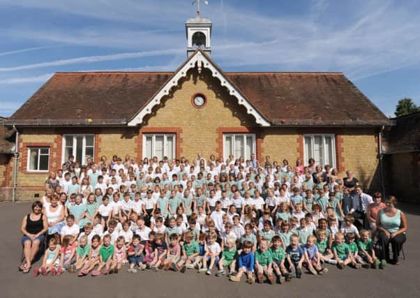 Children at the former Easebourne Primary School pictured in 2013 shortly before the school closed and moved to its present Wheelbarrow Castle site