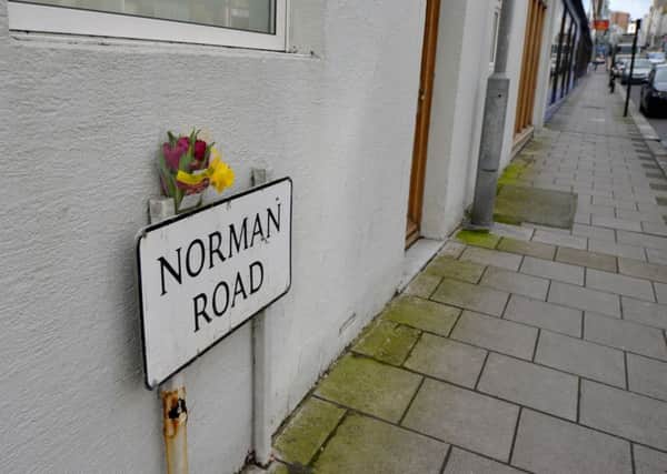 A bunch of flowers in Norman Road, St Leonards, near to where a driver suffered a medical episode at the wheel and died SUS-170903-104041001