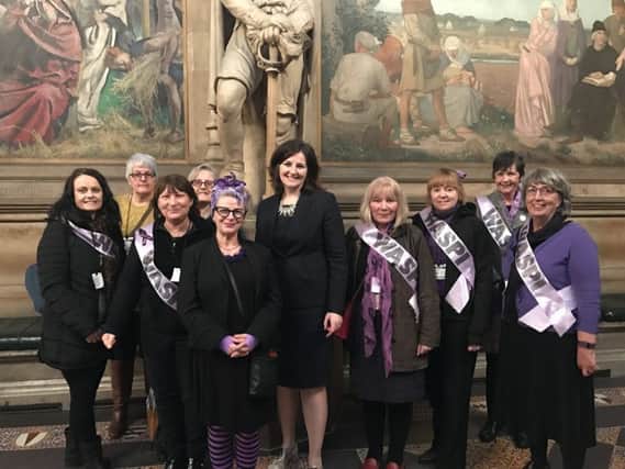 Eastbourne MP Caroline Ansell pictured with local WASPI lobbyists in Parliament