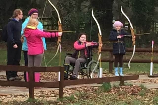 The Girl Guides try their hands at archery
