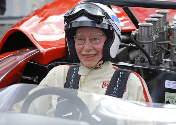 John Surtees prepares to drive a 1967 Lola T70 Spyder at Goodwood Revival in 2014 / Picture: Malcolm Wells (142598-1503)
