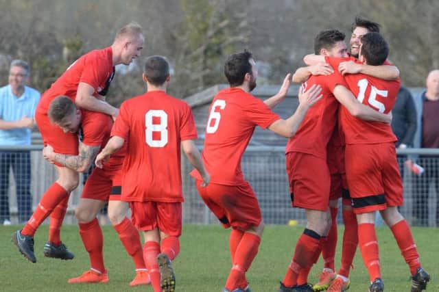 The team celebrate Liam Benson's winning goal. Picture by PW Sporting Photography