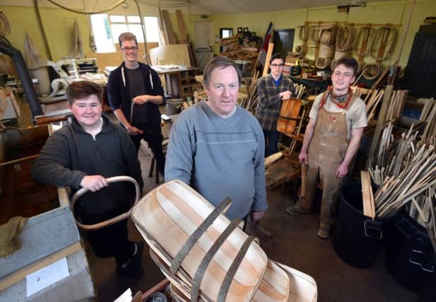 Robin Tuppen and apprentices at Sussex Trugs SUS-170903-000445008