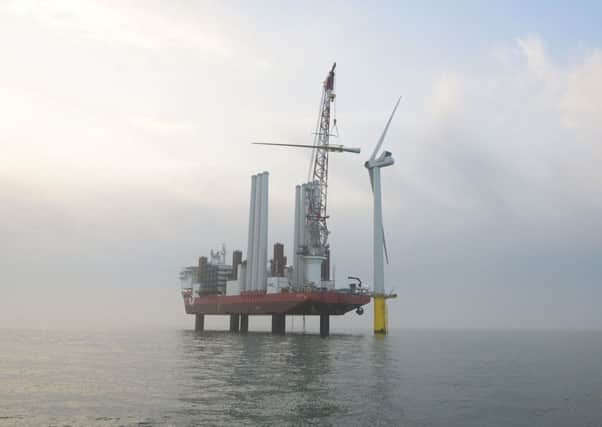 The third blade is attached to the first turbine in the Rampion wind farm. Picture: Alan O'Neill