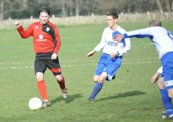 Bexhill AAC on the ball against Sedlescombe Rangers. Pictures by Simon Newstead