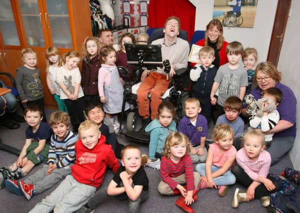 JustDifferent founder Toby Hewson and bookings and community administrator Sarah Robinson with the children from Walberton Pre-School. Picture: Derek Martin DM17312190a
