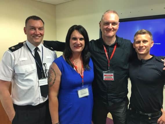 Sophie Cook together with officers from Surrey Police at a recent transgender awareness training event