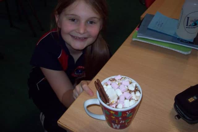 Enjoying a large hot chocolate