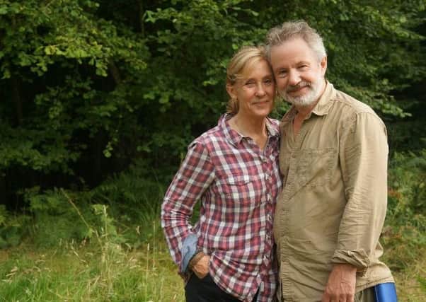 Julie, 62, and Tony Upson, 63, on their woodland land in Tortington