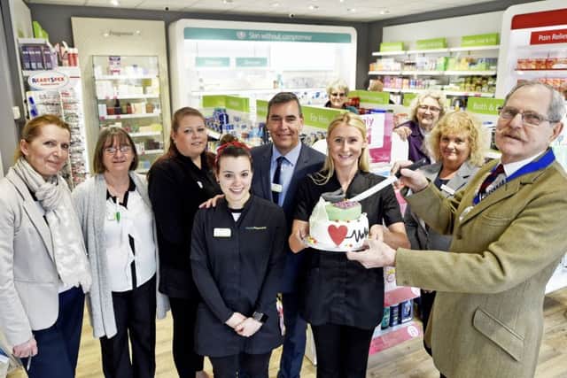 Parish council chairman Ray Osgood reopened the Lloyds Pharmacy in Henfield. Picture: Lloyds SUS-170314-152724001