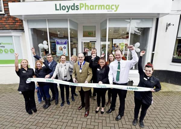 Parish council chairman Ray Osgood reopened the Lloyds Pharmacy in Henfield. Picture: Lloyds SUS-170314-152708001