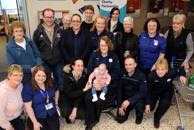 Mum Teresa Thomas with supporters at Tesco Extra in Chichester. Picture: Steve Robards SR1704832