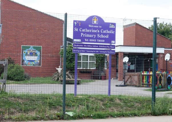 DM16133680a.jpg St Catherine's Catholic Primary School, Littlehampton. Photo by Derek Martin. SUS-160808-170354008