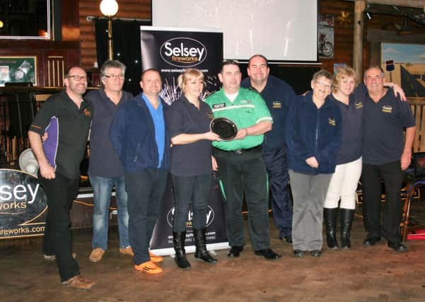 St Johns Ambulance present the Allan Tidy silver plate to the Selsey Fireworks Committee