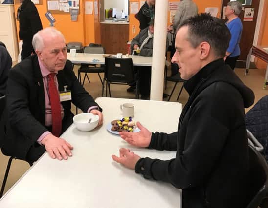 High Sheriff of East Sussex Michael Foster and a guest at Hope Kitchen SUS-170315-111814001