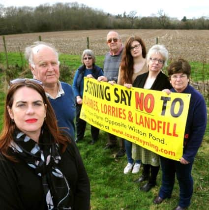 Steyning says 'no' to proposed quarry next to Hammes Farm, Washington Road, Steyning. Katherine Lawrie and Peter Harman in the foreground. Pic Steve Robards