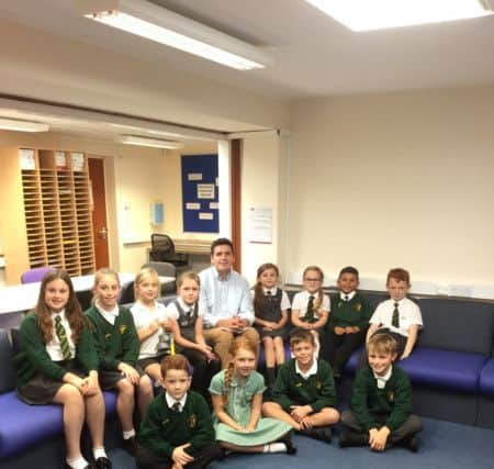 Huw with pupils from Little Common School SUS-170316-125804001