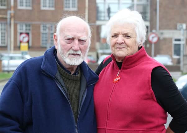 Terry Bridger and his wife pictured outside Chichester Crown Court. Pic: Eddie Mitchell