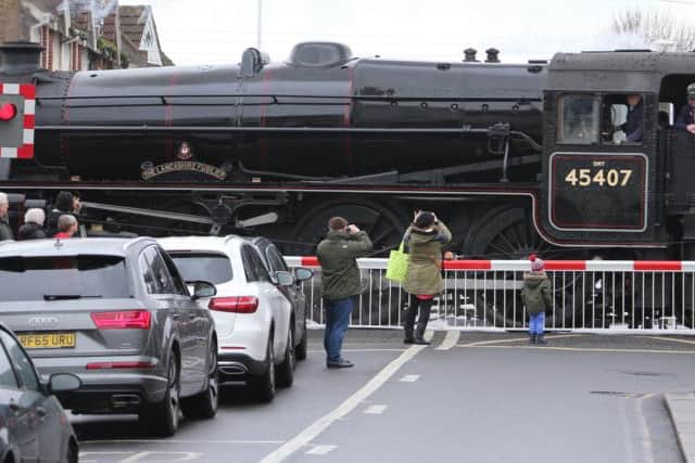 Members of the public stopped to look as the train arrived. Picture by Eddie Mitchell