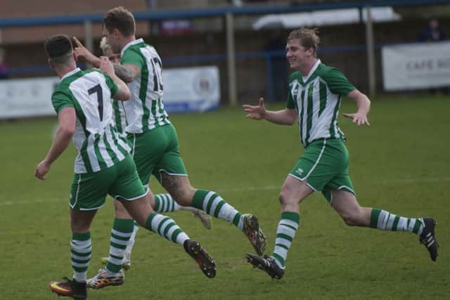 Goal celebration time for City at Haywards Heath / Picture by Tommy McMillan