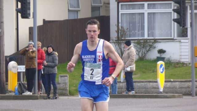 Ben Fish on his way to victory in the 2017 Hastings Half Marathon. Picture by Simon Newstead
