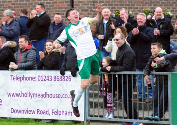James Crane celebrates one of his two goals against Folkestone / Picture by Kate Shemilt