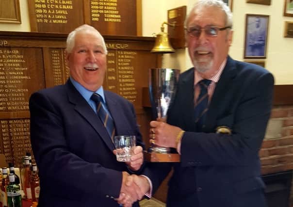 The summer singles trophy is presented at Selsey GC